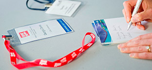 Table with notepad and lanyard